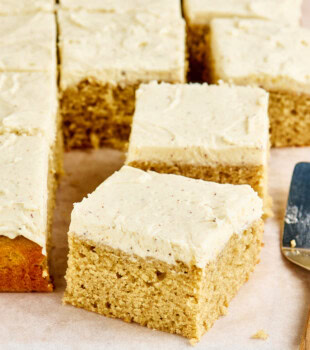 sliced spice sheet cake topped with brown butter frosting