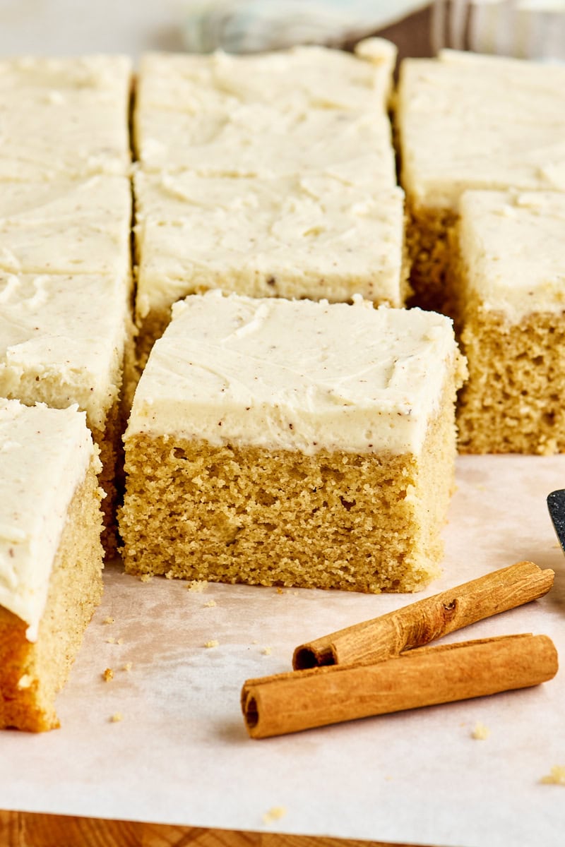 sliced spice sheet cake with brown butter frosting